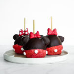 Minnie Mouse Chocolate Covered Caramel Apple // magicaltreatsathome.com