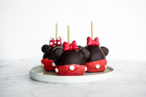 Minnie Mouse Chocolate Covered Caramel Apple // magicaltreatsathome.com