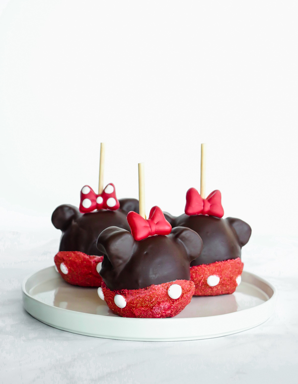 Minnie Mouse Chocolate Covered Caramel Apple // magicaltreatsathome.com