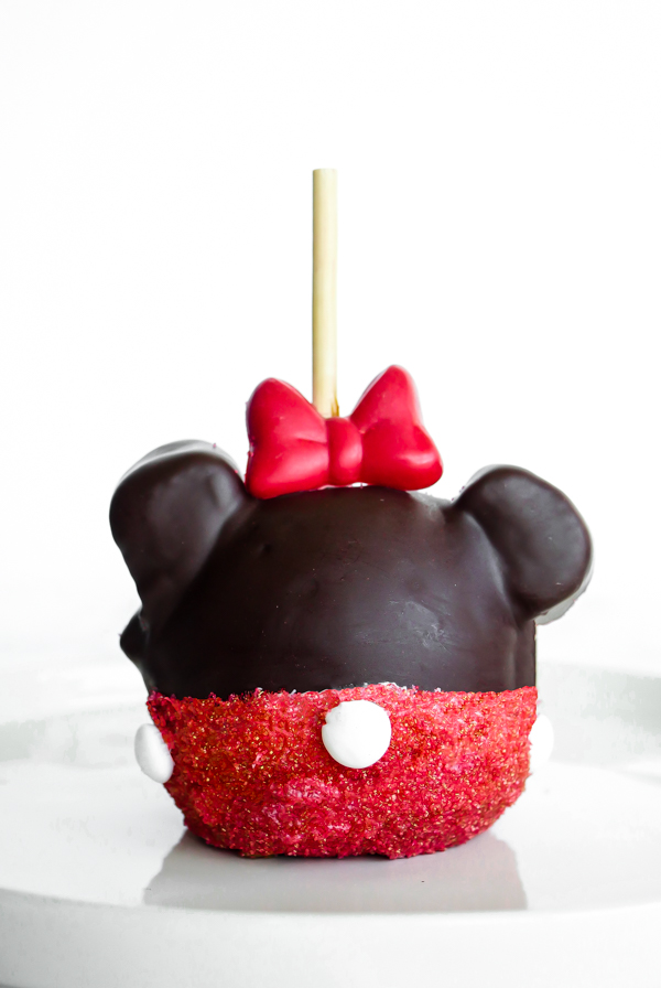 Minnie Mouse Chocolate Covered Caramel Apple // magicaltreatsathome.com