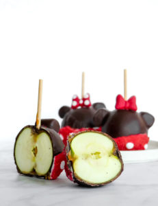 Minnie Mouse Chocolate Covered Caramel Apple // magicaltreatsathome.com
