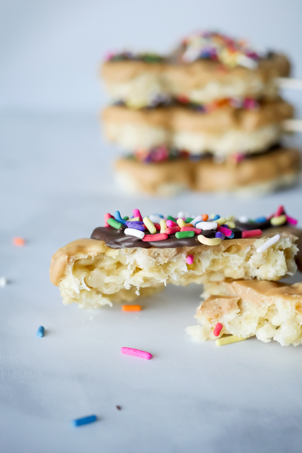 Mickey Mouse Peanut Butter Rice Krispie Treat Pops // magicaltreatsathome.com