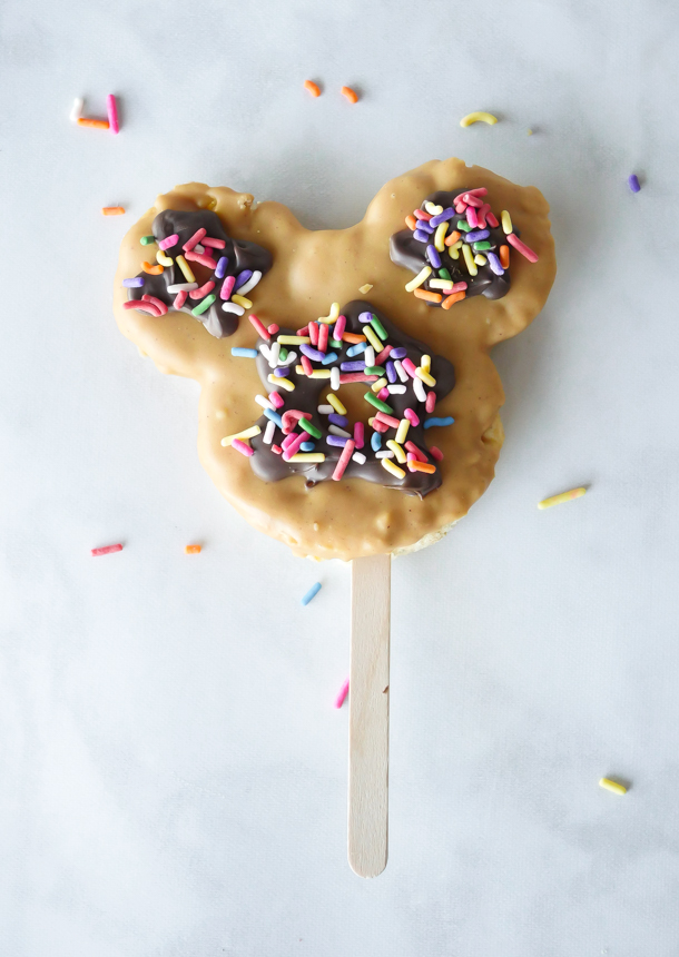 Mickey Mouse Peanut Butter Rice Krispie Treat Pops // magicaltreatsathome.com